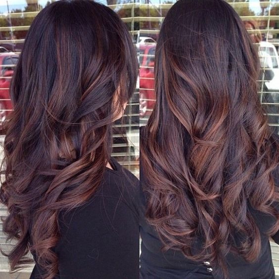 Highlights on dark medium hair. Fashionable color on tips, back and front view, photo
